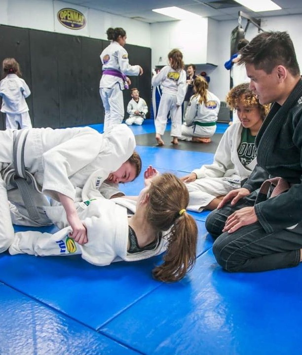 Teen BJJ hands on teaching