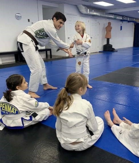 Kids BJJ hands on teaching