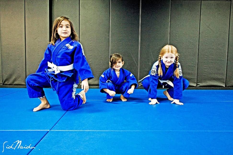 3 kids doing Gi BJJ